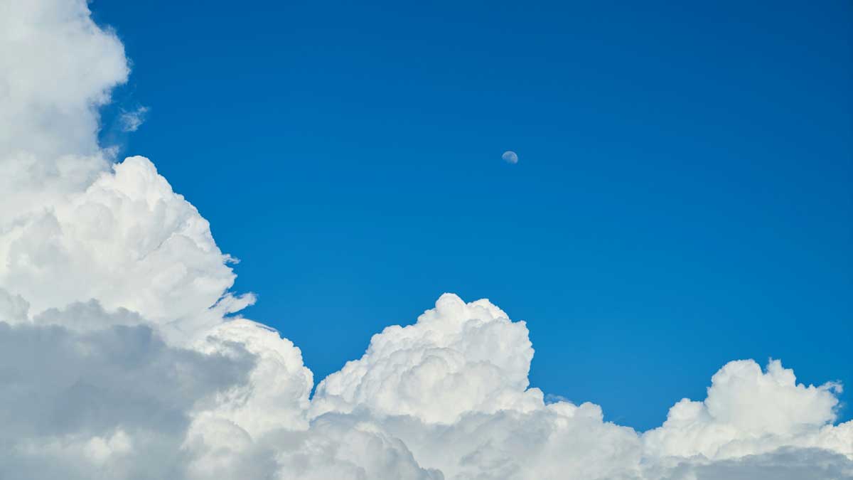 An image of blue sky clouds for the Fullframe Creative Agency Lausanne Geneve video production blog on preparing for weather conditions advice tips and tricks. Image by Engin Akyurtt on Unsplash.