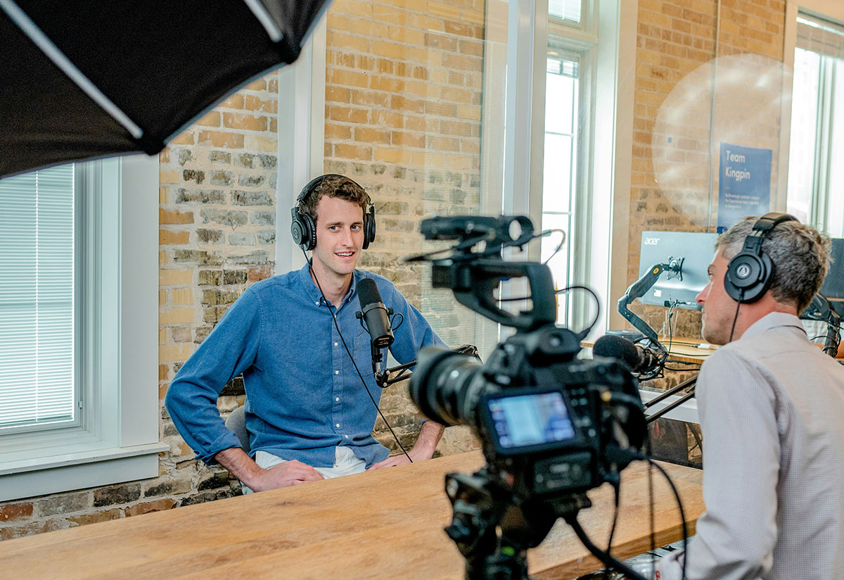 An image of a man being interviewed for the fullframe blog post on interview video production, image by Austin Distel on unsplash