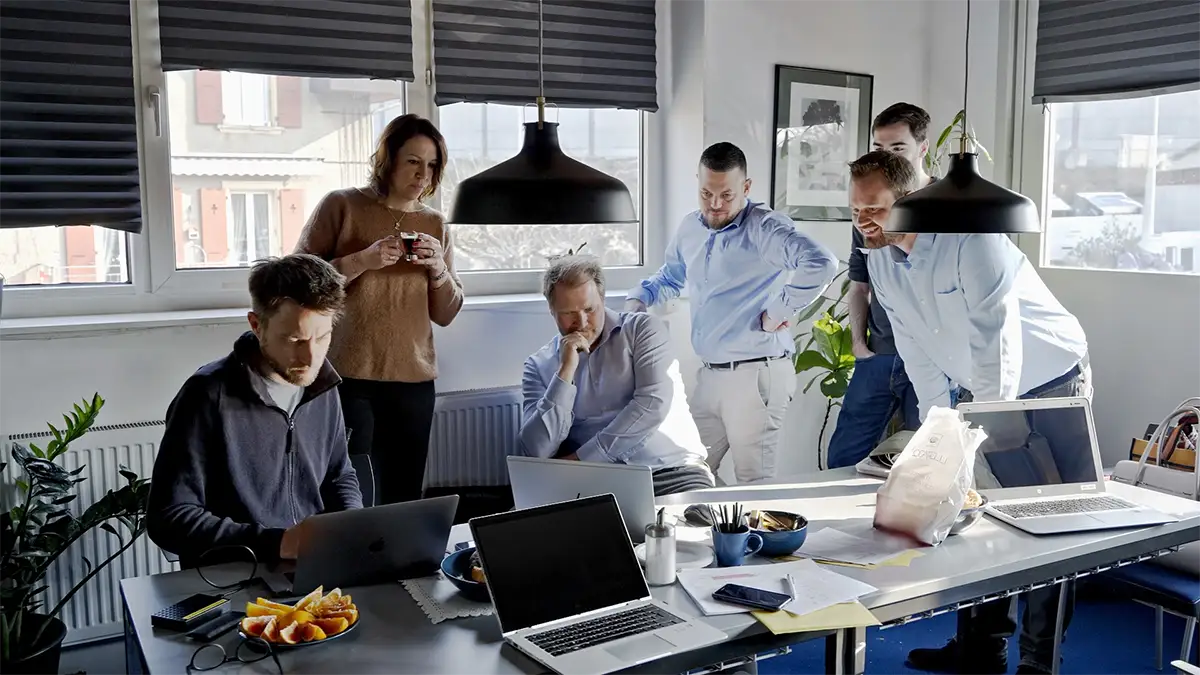 Image showing members of the Fullframe Creative agency gathered with clients for a video production service pre-production meeting.