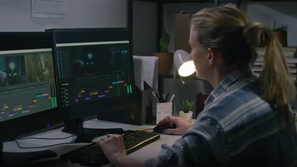 Image of a young woman using video editing software in video production service provided by the fullframe creative agency.