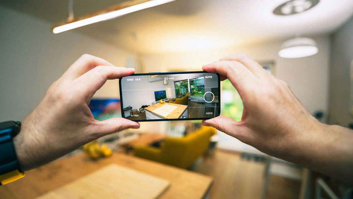 Person using augmented reality for the Fullframe blogpost on ar augmented reality, vr virtual reality, mr mixed reality, xr extended reality in video production. Image by Jakub Zerdzicki on Unsplash.