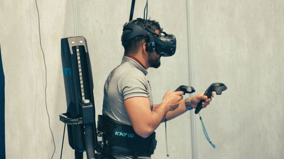 An image of a man using a vr gaming contraption for the Fullframe blogpost on ar augmented reality, vr virtual reality, mr mixed reality, xr extended reality in video production. Image by stephane bernard on unsplash